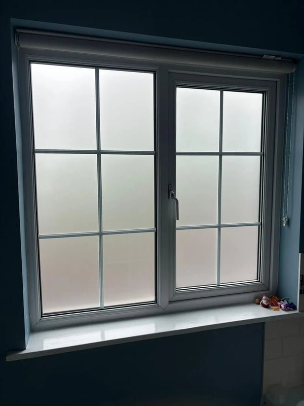 Aluminium bifold doors and apex window with garden view from inside a new extension, Bristol