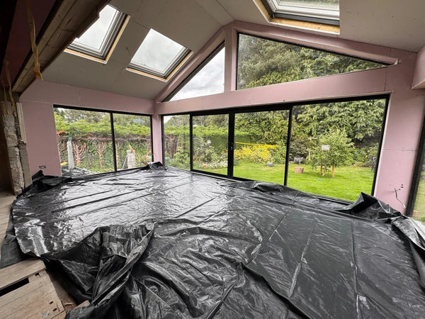Large aluminium fixed picture windows on a single-storey extension, Bristol