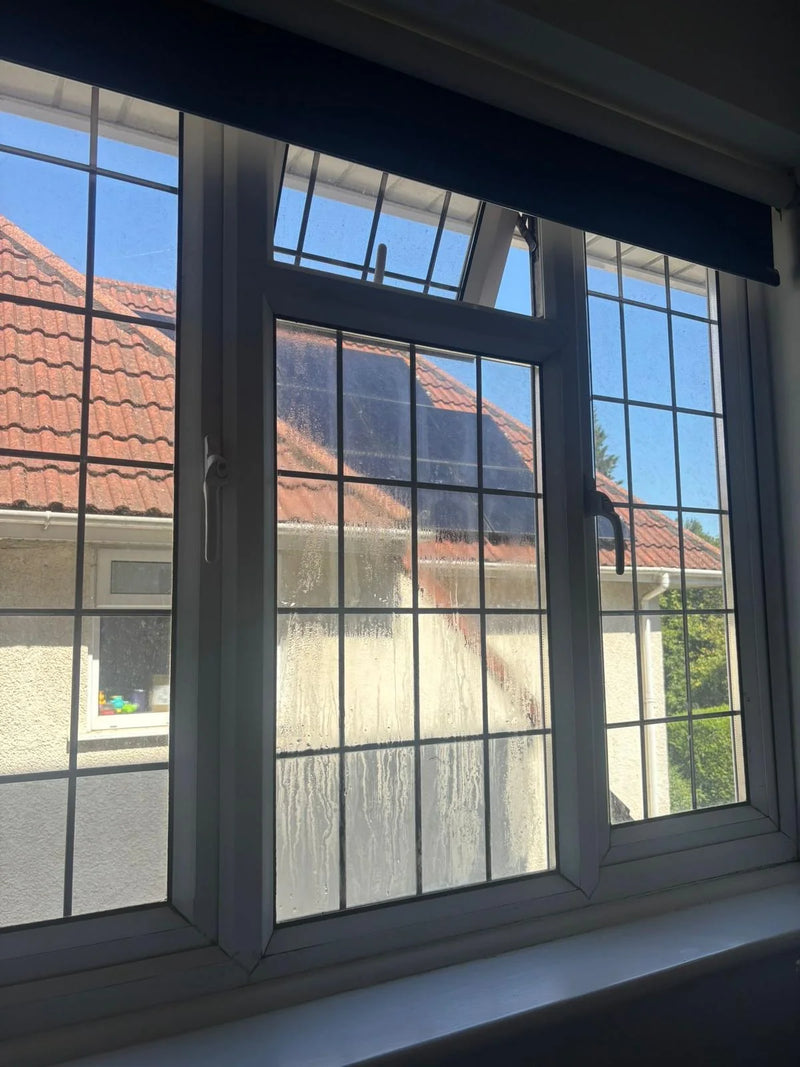 Double glazing repair needed on misted centre pane of leaded window in Bristol