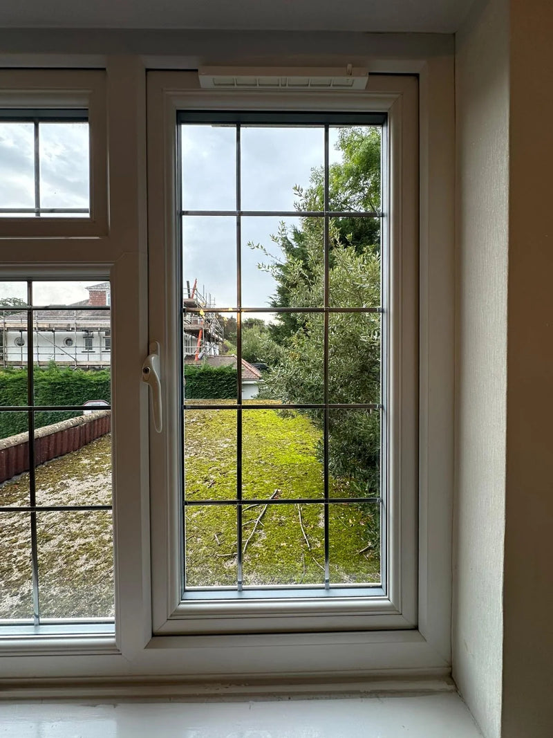 Double glazing repaired with clear glass in leaded casement window in Bristol