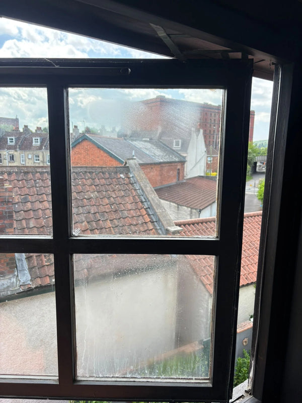 Heavy condensation between panes of sash window in Bedminster, Bristol