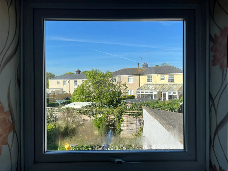 Misty window before new double glazing installation by Pane Relief, Bristol