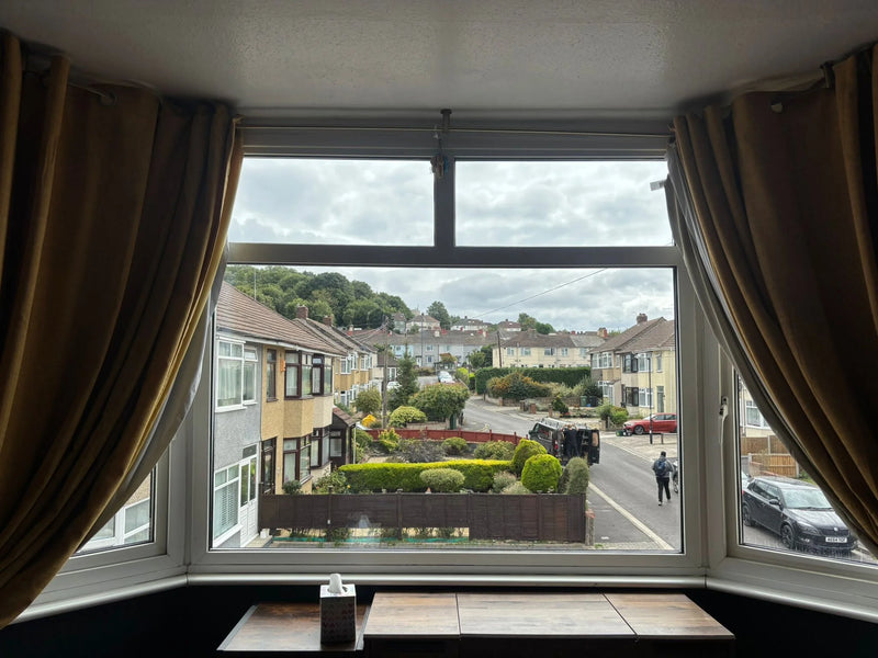 New double glazed bay window with clear street view after installation in Knowle, Bristol